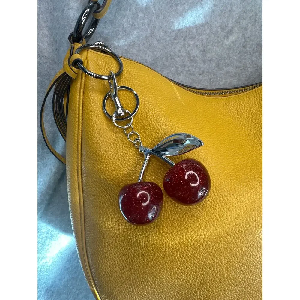 Coach Sutton Hobo Bag Polished Pebble Leather Yellow Cherry Charm 35593